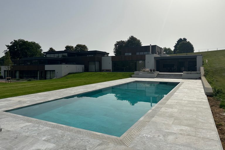 Mapei system repairs & transforms outdoor pool