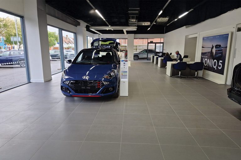 UltraTile transforms car showroom from “drab to fab”